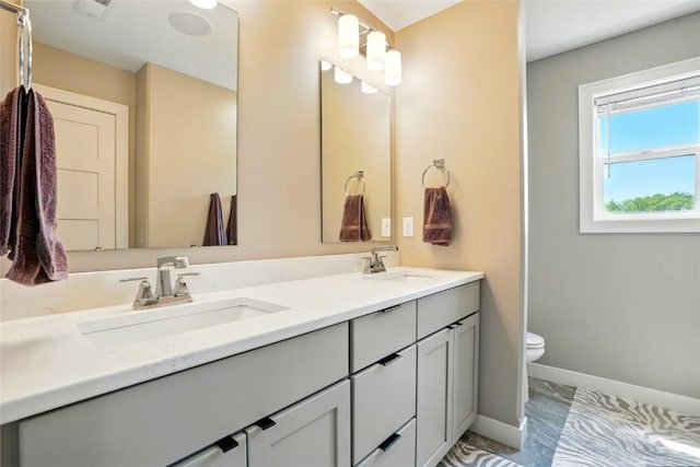 1643 Avalon Pl, Iowa City, IA 52245 - bathroom with marble finish floors and double vanity