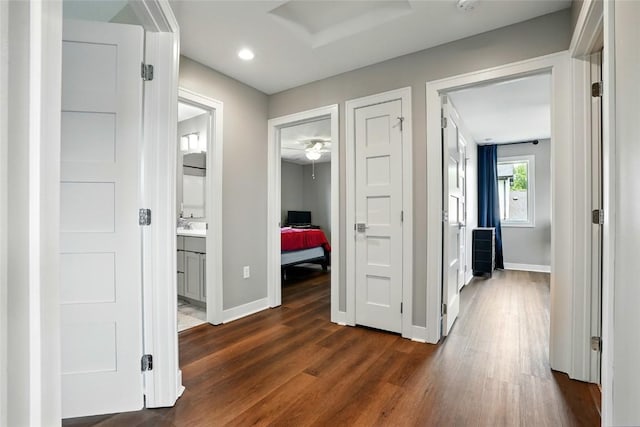 1643 Avalon Pl, Iowa City, IA 52245 - corridor with dark wood-style flooring and recessed lighting