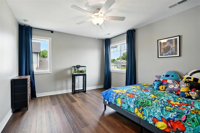 1643 Avalon Pl, Iowa City, IA 52245 - bedroom with dark wood finished floors and ceiling fan