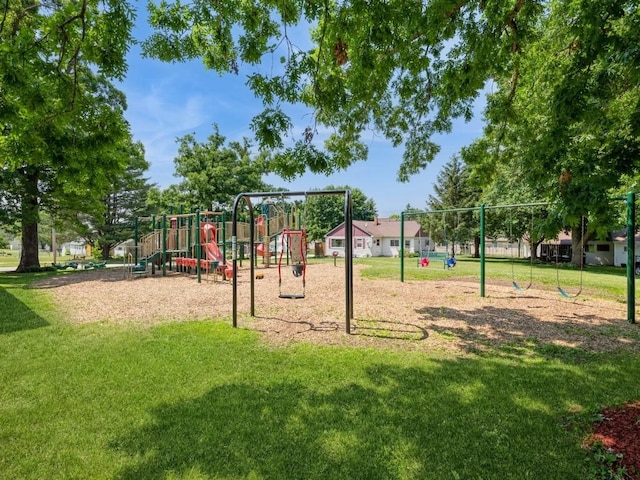 304 3rd St S, Coggon, IA 52218 - community play area featuring a lawn
