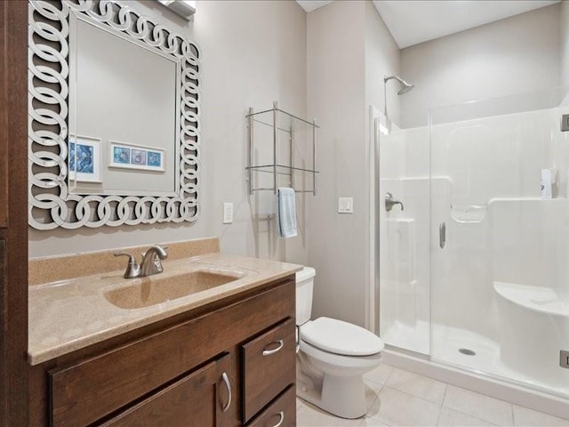100 4th Ave SW Unit 204, Cedar Rapids, IA 52404 - bathroom with a shower stall, vanity, and tile patterned floors