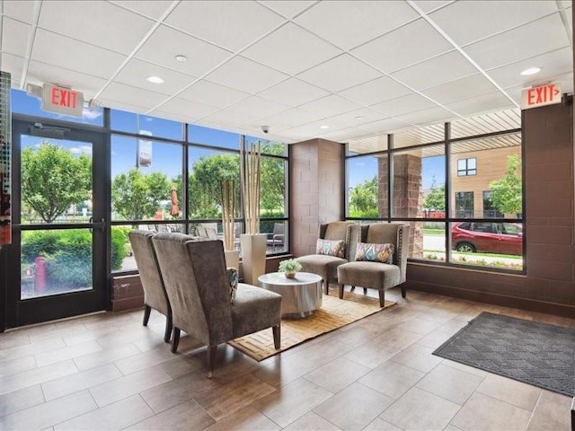 100 4th Ave SW Unit 204, Cedar Rapids, IA 52404 - common area with a paneled ceiling, floor to ceiling windows, and recessed lighting