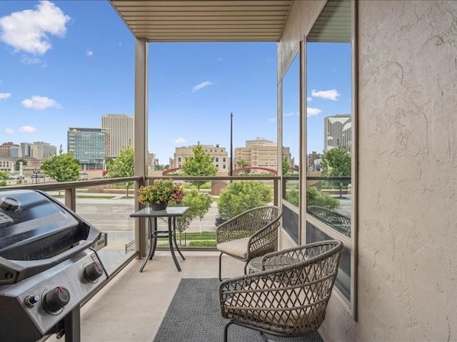 100 4th Ave SW Unit 204, Cedar Rapids, IA 52404 - balcony featuring grilling area and a view of city