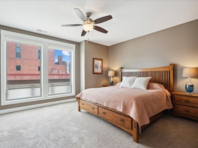 100 4th Ave SW Unit 204, Cedar Rapids, IA 52404 - bedroom featuring carpet and ceiling fan