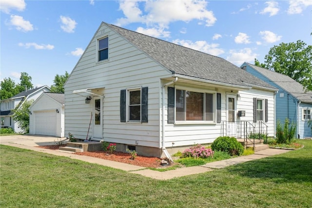 2901 J St SW, Cedar Rapids, IA 52404 - view of front of house with a front lawn, roof with shingles, a garage, and concrete driveway