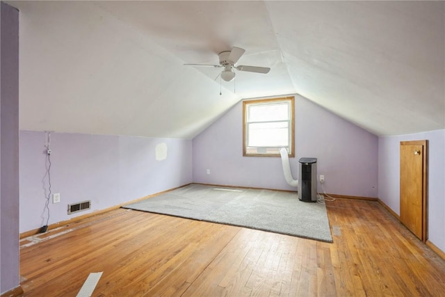 2901 J St SW, Cedar Rapids, IA 52404 - additional living space with light wood-type flooring, a ceiling fan, and lofted ceiling