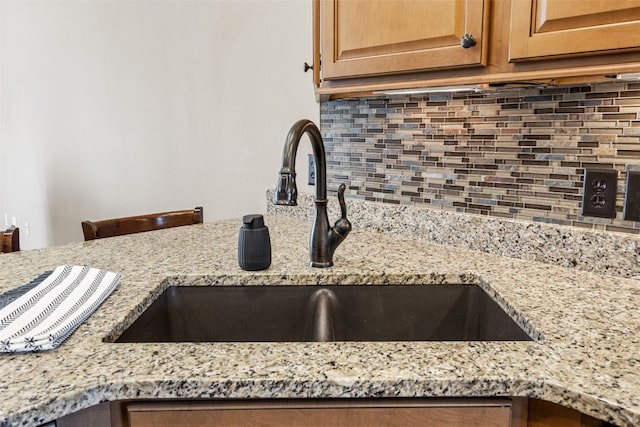 345 Shannon Dr, Robins, IA 52328 - kitchen view of light stone countertops and tasteful backsplash