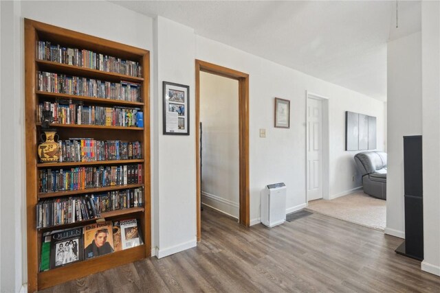 1802 9th Ave, Belle Plaine, IA 52208 - hallway with wood finished floors and baseboards