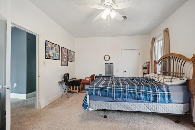 1802 9th Ave, Belle Plaine, IA 52208 - bedroom with carpet flooring and ceiling fan
