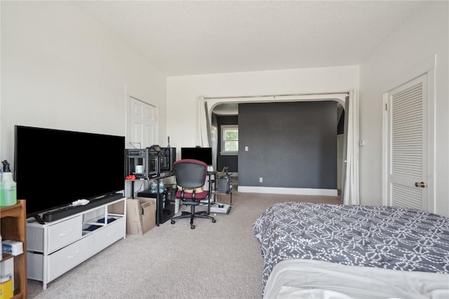 1802 9th Ave, Belle Plaine, IA 52208 - bedroom featuring carpet flooring and an office area