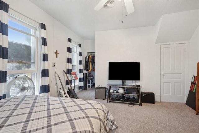 1802 9th Ave, Belle Plaine, IA 52208 - bedroom featuring multiple windows, carpet floors, and ceiling fan
