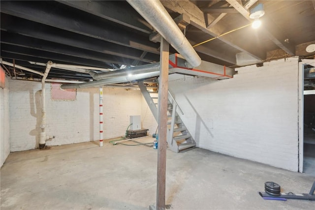1802 9th Ave, Belle Plaine, IA 52208 - unfinished basement featuring stairway