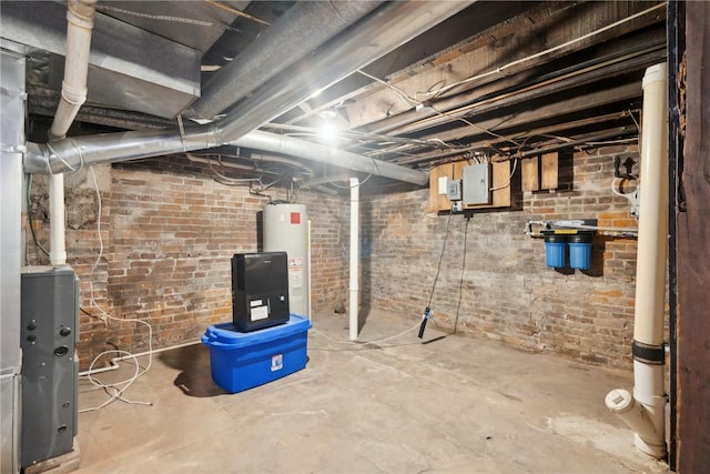 1802 9th Ave, Belle Plaine, IA 52208 - unfinished basement featuring water heater, electric panel, and brick wall