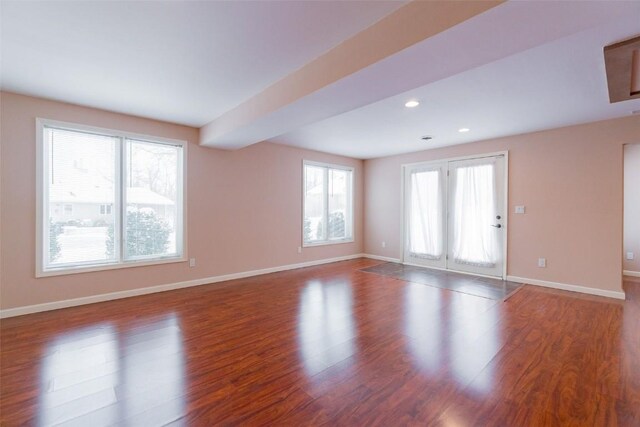 4402 Oak Leaf Ct NE, Cedar Rapids, IA 52411 - spare room with wood finished floors and recessed lighting