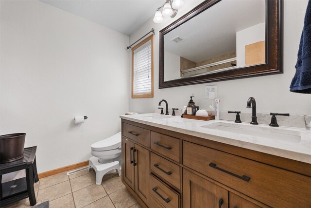 429 W Prairie Dr, Fairfax, IA 52228 - full bathroom with double vanity, tile patterned flooring, and a shower