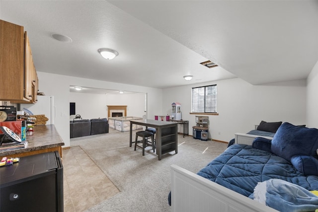 429 W Prairie Dr, Fairfax, IA 52228 - living room with light colored carpet and a fireplace