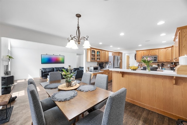 429 W Prairie Dr, Fairfax, IA 52228 - dining room with recessed lighting, dark wood finished floors, and a chandelier
