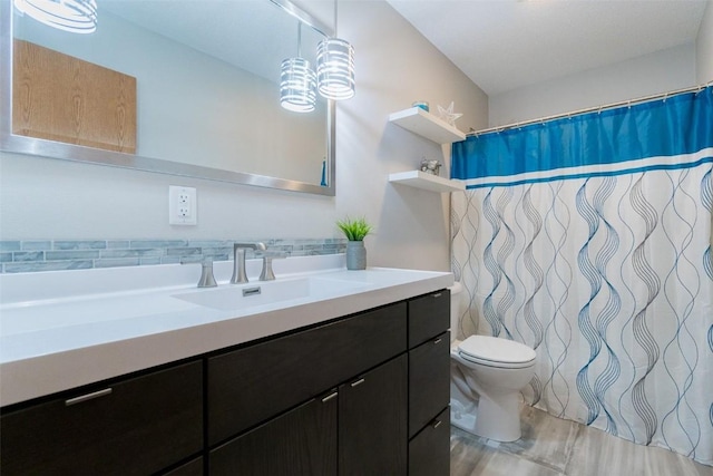 310 34th Ave, Marion, IA 52302 - bathroom featuring vanity and toilet