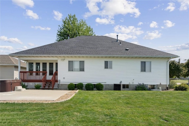 310 34th Ave, Marion, IA 52302 - back of house featuring a patio area, a yard, and a shingled roof
