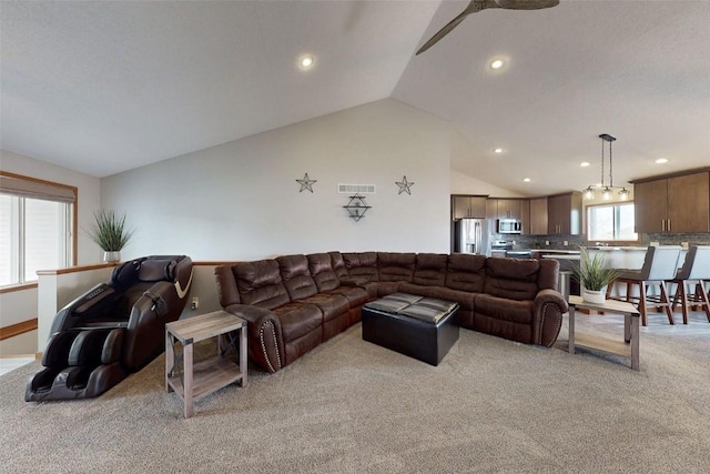 310 34th Ave, Marion, IA 52302 - living room featuring light colored carpet, lofted ceiling, recessed lighting, and ceiling fan