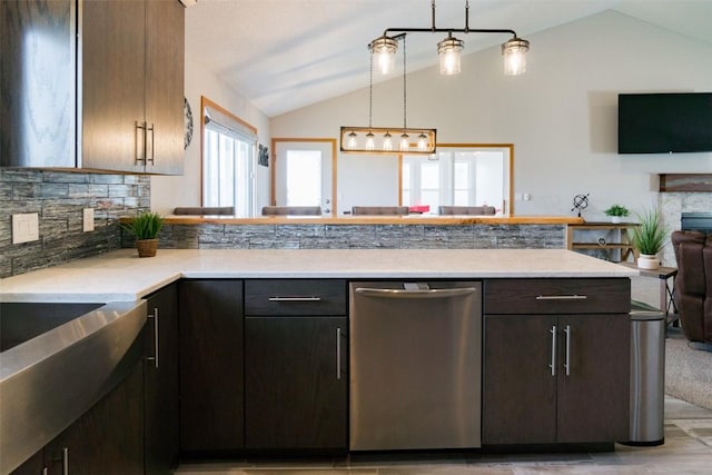 310 34th Ave, Marion, IA 52302 - kitchen with stainless steel dishwasher, vaulted ceiling, open floor plan, a peninsula, and decorative light fixtures