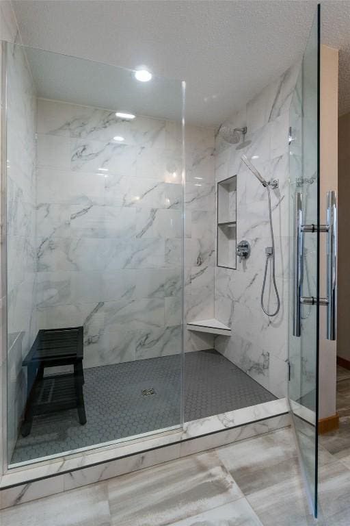 310 34th Ave, Marion, IA 52302 - bathroom with a marble finish shower and recessed lighting