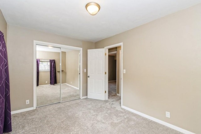 2175 Chandler St SW, Cedar Rapids, IA 52404 - unfurnished bedroom with carpet flooring and a closet