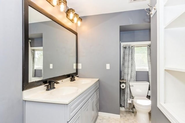 2175 Chandler St SW, Cedar Rapids, IA 52404 - full bathroom featuring double vanity, healthy amount of natural light, and curtained shower