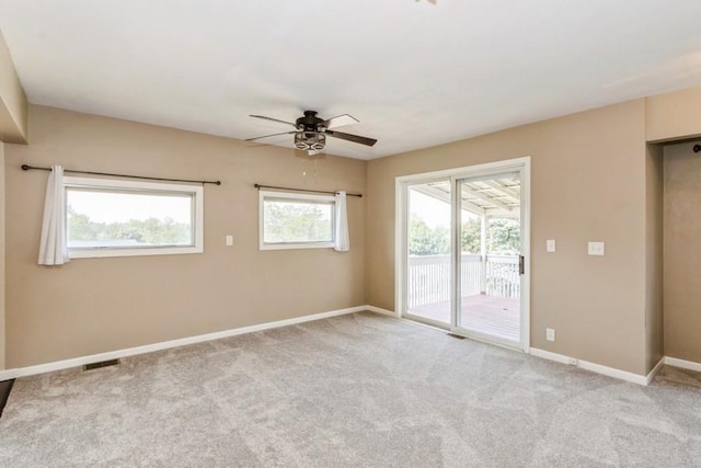 2175 Chandler St SW, Cedar Rapids, IA 52404 - spare room featuring a ceiling fan and carpet