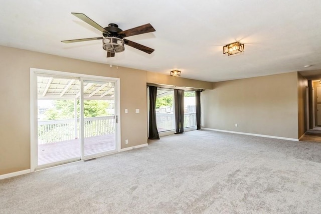 2175 Chandler St SW, Cedar Rapids, IA 52404 - empty room with light carpet and ceiling fan