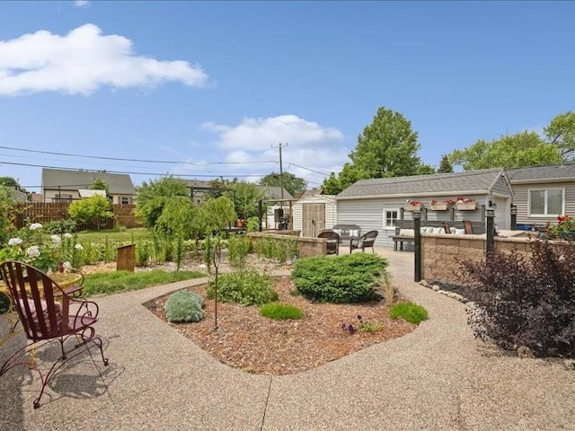 1418 8th St NW, Cedar Rapids, IA 52405 - view of yard featuring a shed and a patio area