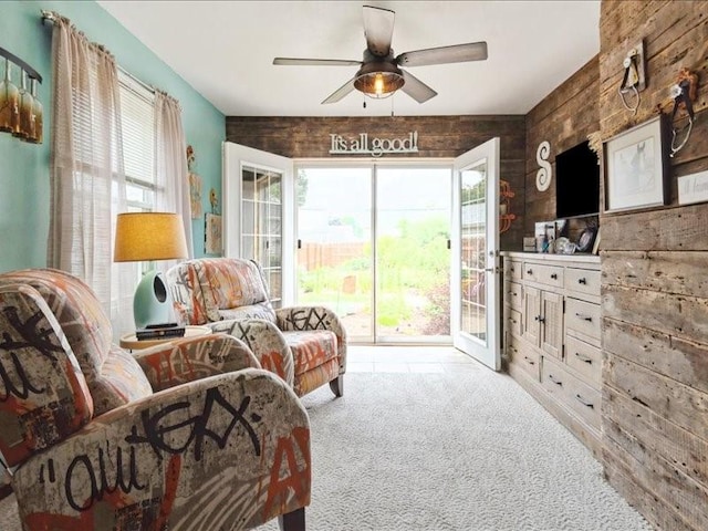 1418 8th St NW, Cedar Rapids, IA 52405 - living area featuring carpet flooring, ceiling fan, and healthy amount of natural light