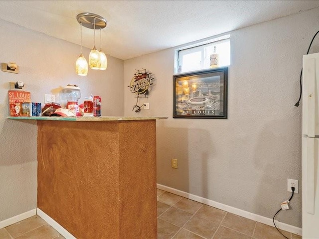 1418 8th St NW, Cedar Rapids, IA 52405 - bar area with tile patterned flooring and hanging light fixtures