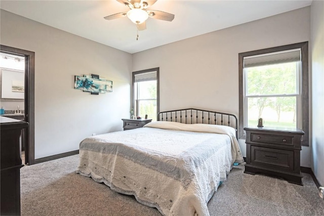 1602 Bridge Creek Ct, Marion, IA 52302 - carpeted bedroom with baseboards and ceiling fan