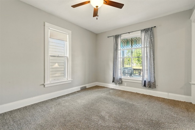 216 15th St NE, Cedar Rapids, IA 52402 - carpeted spare room with a ceiling fan and baseboards