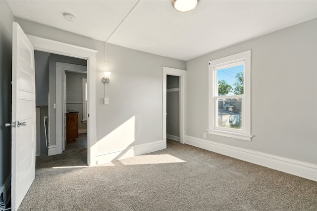 216 15th St NE, Cedar Rapids, IA 52402 - unfurnished bedroom featuring carpet and baseboards