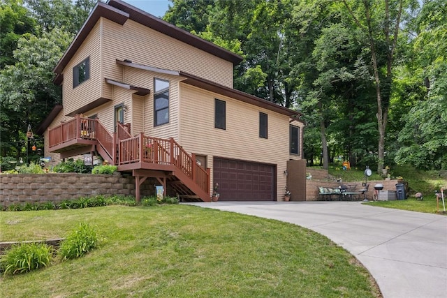 2145 Coldstream Ave NE, Cedar Rapids, IA 52402 - view of front of house featuring driveway, a garage, a front lawn, stairs, and view of wooded area