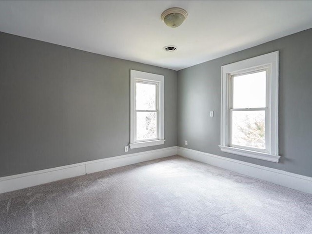 1308 A Ave NW, Cedar Rapids, IA 52405 - carpeted empty room with baseboards