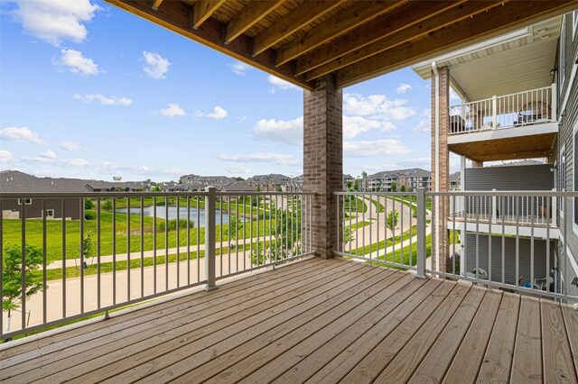 2871 Spring Rose Cir Unit 207, Coralville, IA 52241 - wooden deck with a water view