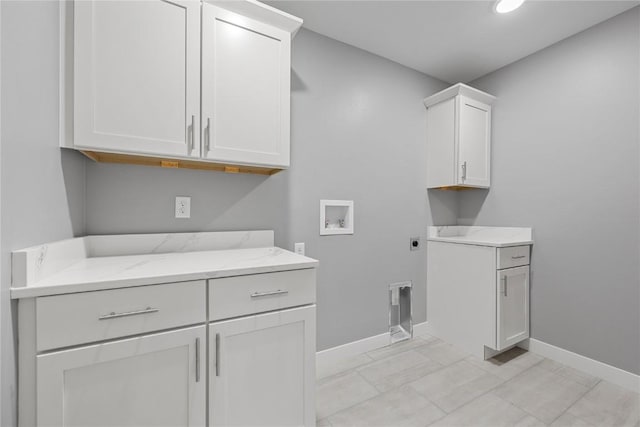 3911 Winnsboro Dr, Iowa City, IA 52245 - laundry room with cabinet space, hookup for an electric dryer, and washer hookup
