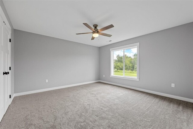 3911 Winnsboro Dr, Iowa City, IA 52245 - carpeted empty room with ceiling fan and baseboards