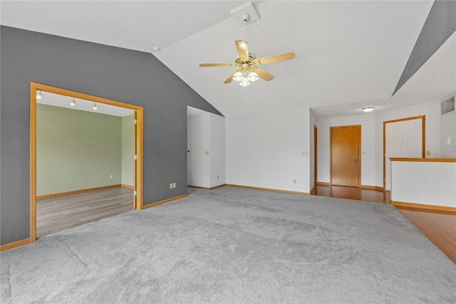 3110 Towne House Dr NE Unit C, Cedar Rapids, IA 52402 - carpeted empty room featuring lofted ceiling and ceiling fan