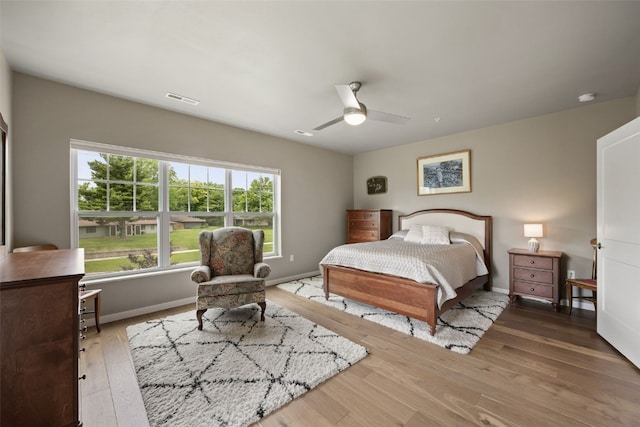 260 N Scott Blvd Unit 201, Iowa City, IA 52245 - bedroom featuring wood finished floors and ceiling fan