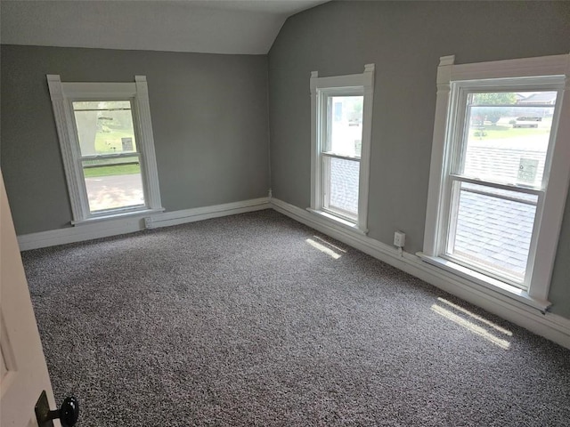 920 E Washington St, Center Point, IA 52213 - carpeted spare room featuring lofted ceiling and healthy amount of natural light