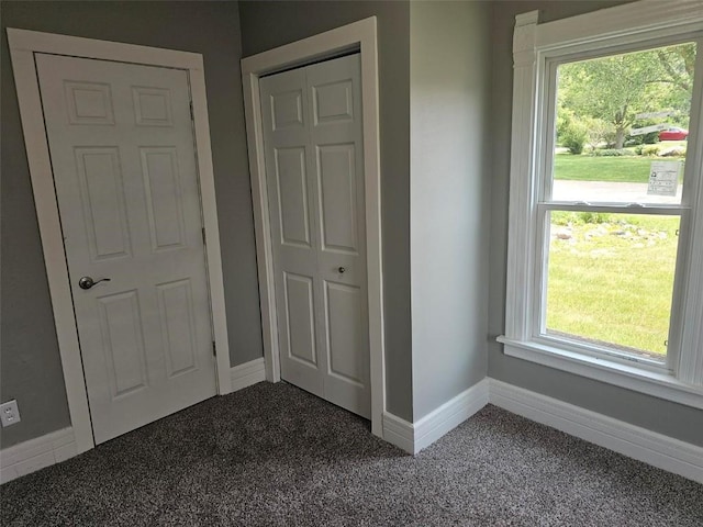 920 E Washington St, Center Point, IA 52213 - hall with carpet and plenty of natural light