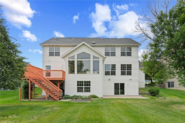 218 Teakwood Ln NE, Cedar Rapids, IA 52402 - back of property with stairs, a patio, a deck, and a yard