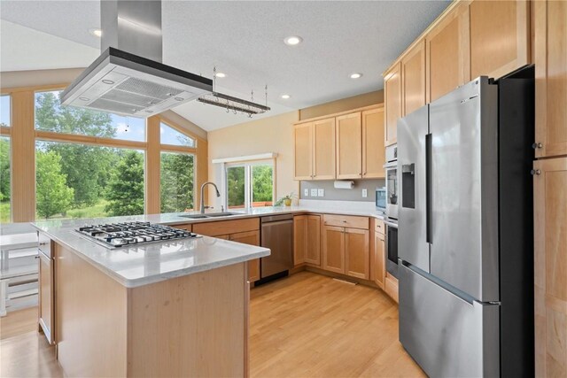 218 Teakwood Ln NE, Cedar Rapids, IA 52402 - kitchen with appliances with stainless steel finishes, range hood, light brown cabinets, light countertops, and recessed lighting
