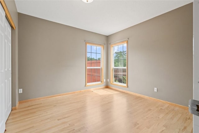 218 Teakwood Ln NE, Cedar Rapids, IA 52402 - unfurnished room featuring light wood-type flooring and baseboards