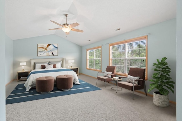 218 Teakwood Ln NE, Cedar Rapids, IA 52402 - carpeted bedroom featuring multiple windows, lofted ceiling, and a ceiling fan