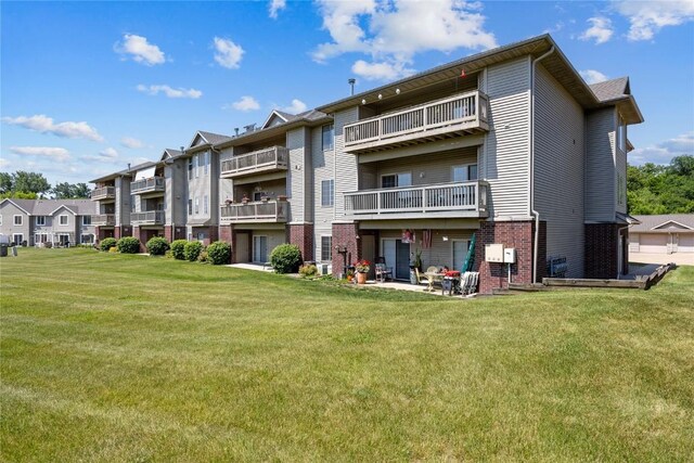 250 Cimarron Dr NE, Hiawatha, IA 52233 - view of building exterior with a residential view